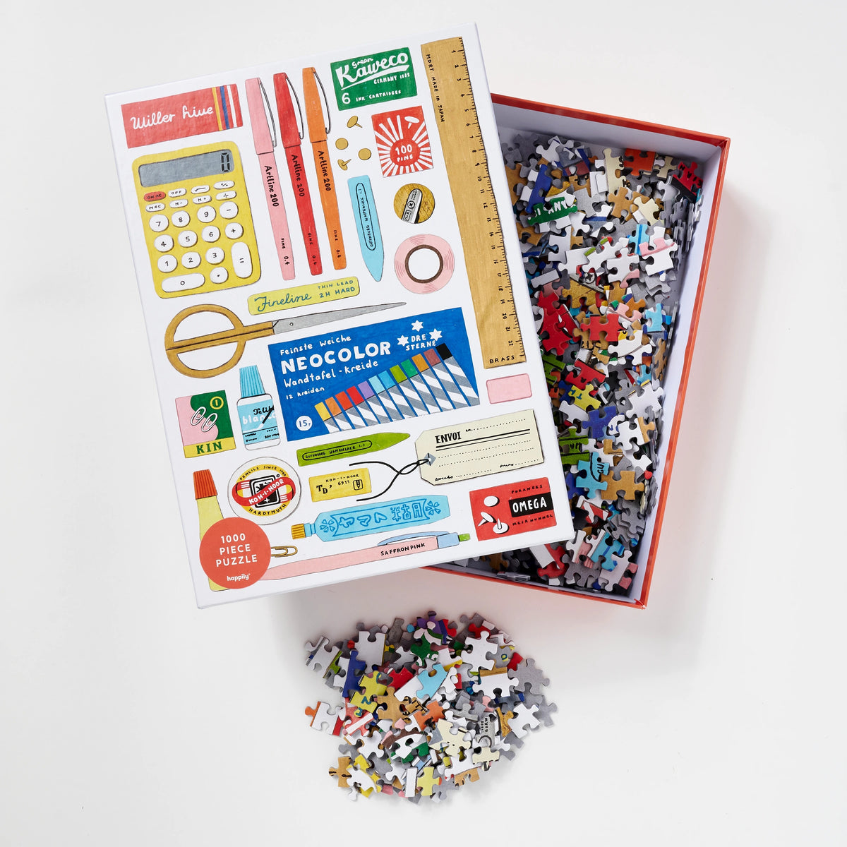 Puzzle Stationery Happily 1000 peças, caixa aberta com peças
